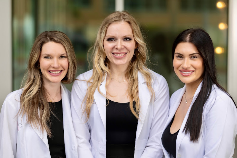 The Snyder Plastic Surgery care team in white lab coats